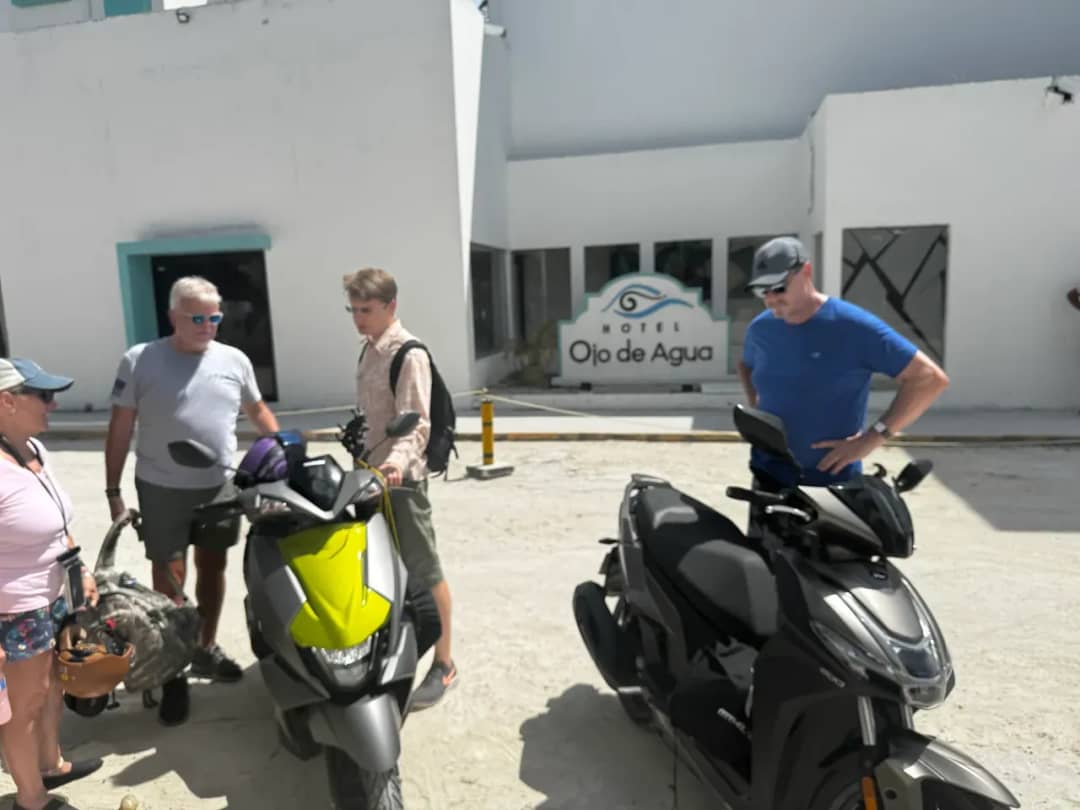 Two AcuMota rental scooters handed over to guests at Hotel Ojo de Agua in Puerto Morelos